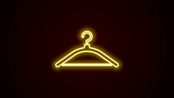 Ragyogó neon vonal Hanger szekrény ikon elszigetelt fekete háttérrel. Öltöző ikon. Ruhatisztító szimbólum. Mosodai vállfa tábla. 4K Videó mozgás grafikus animáció - Felvétel, videó