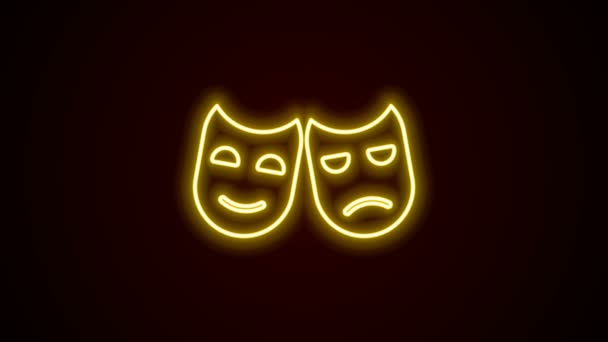 Linha de néon brilhante Comédia e tragédia máscaras teatrais ícone isolado no fundo preto. Animação gráfica em movimento de vídeo 4K - Filmagem, Vídeo