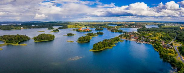Aerial view of Trakai, over medieval gothic Island castle in Galve lake. Flat lay of the most beautiful Lithuanian landmark. Trakai Island Castle, most popular tourist destination in Lithuania - Photo, Image