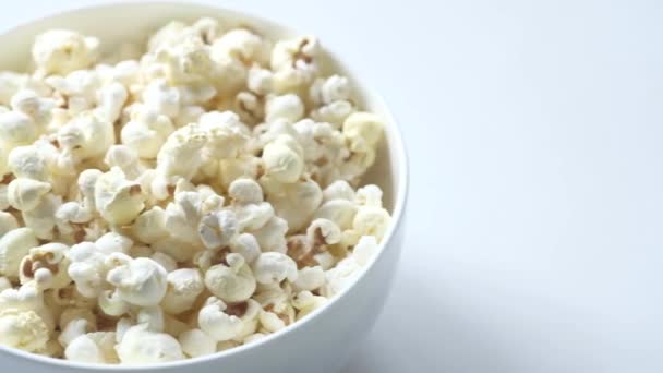  popcorn in a bowl on wooden desk - Footage, Video