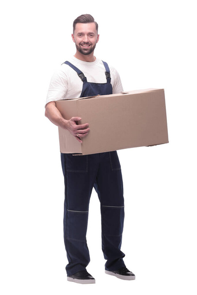 man in workwear with cardboard box isolated on white background - Zdjęcie, obraz