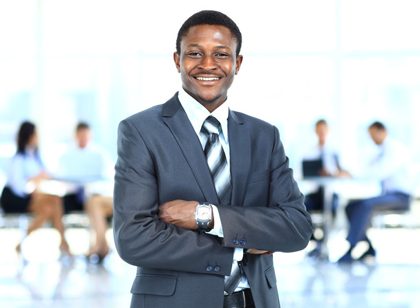 Handsome young african american businessman in office - Valokuva, kuva