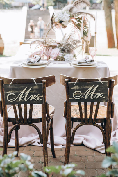 groom and bride chairs in wedding ceremony - Foto, imagen