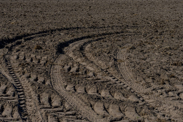 Netherlands, Lisse, Europe, tractor tyre marks on sand - Photo, Image