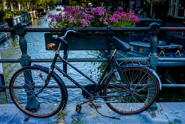 Netherlands,South Holland,Europe, a bicycle parked on the side of a road - Photo, Image