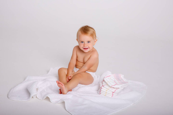 Infant child baby toddler sitting crawling backwards happy smiling on a white background - Foto, Imagem