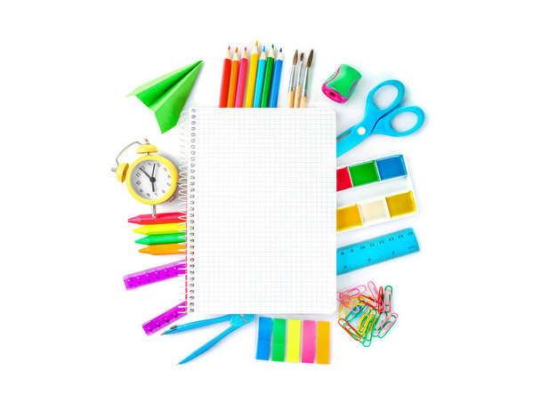 Frame of school supplies isolated on white background. Top view. Copy space. - Photo, Image