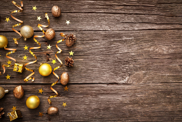 Christmas decorations on wooden background. Top view. Copy space. - Photo, Image