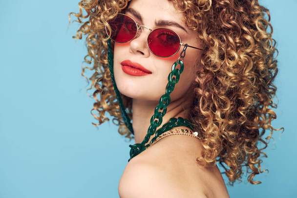 Beautiful woman Curly hair ornaments close-up bright makeup - Zdjęcie, obraz
