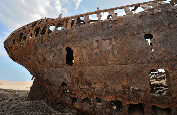 The hull of the ship Eduard Bohlan withstanding destruction in the Namib desert since 1909 - Photo, Image