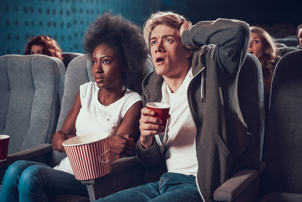  A man is surprised while watching a movie.  - Фото, изображение