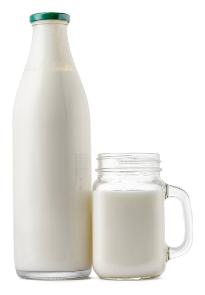 Glass bottle and cup of fresh milk isolated - Foto, imagen