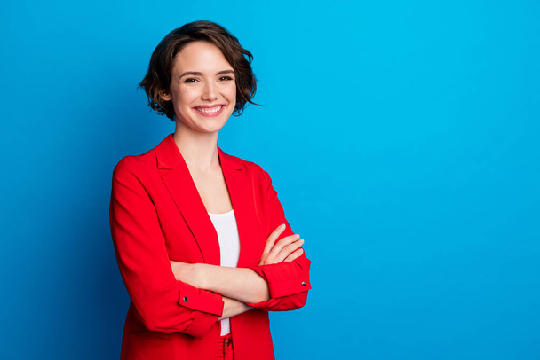 Portrait of nice attractive content cheerful lady folded arm copy empty space isolated over bright blue color background - Zdjęcie, obraz