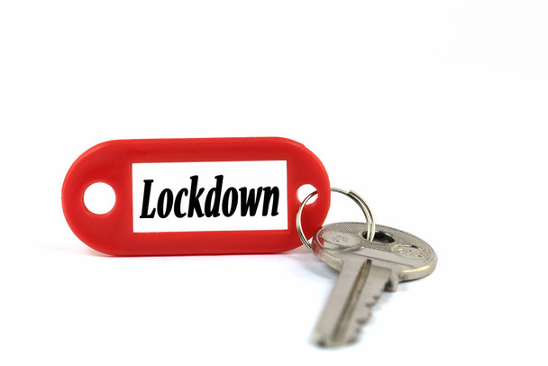 Key and key fob labeled Lockdown - Photo, Image
