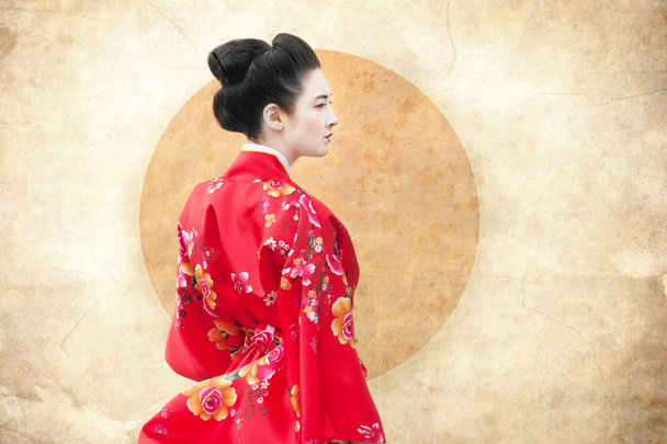 Vintage style portrait of a woman in red kimono - Φωτογραφία, εικόνα