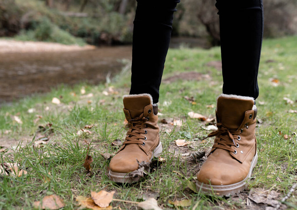brown boots women's feet in the mountain - 写真・画像