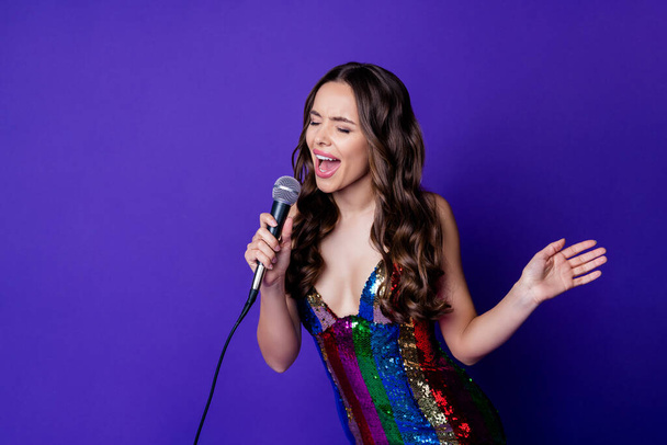 Photo of crazy funky girl sing song hold mic wear skirt isolated bright violet color background - Fotografie, Obrázek