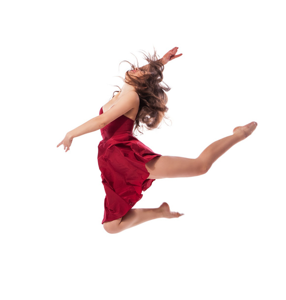 Young ballet dancer wearing red dress isolated - Photo, Image