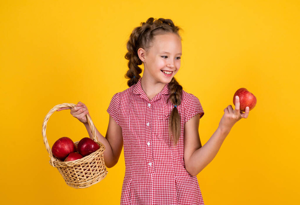 child hold healthy apple fruit for natural vitamin eating while dieting, vegetarian - Foto, Imagem