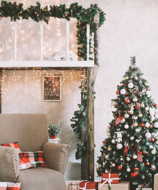 Interior room decorated for Christmas.  Home comfort of modern house. Scandinavian style Christmas home interior, relaxing place. - Φωτογραφία, εικόνα