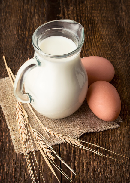 Baking ingredients : milk, eggs and wheat  - Φωτογραφία, εικόνα