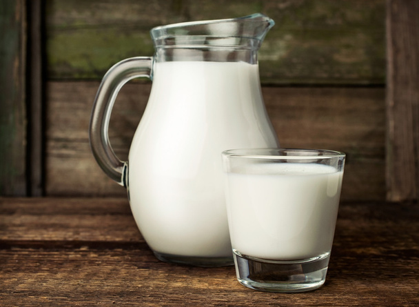 fresh milk in glass jug and glass  - Valokuva, kuva