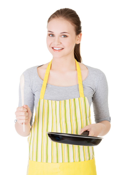 Smiling woman with the frying pan - Zdjęcie, obraz