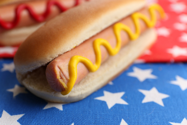 Tasty hot dogs on napkin with stars - Foto, Imagem