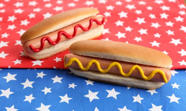 Tasty hot dogs on napkin with stars - Foto, imagen