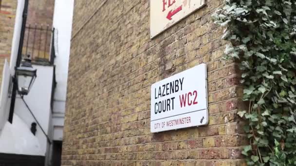 A Lazenby Court Address Sign on a Red Bricks Wall - 映像、動画