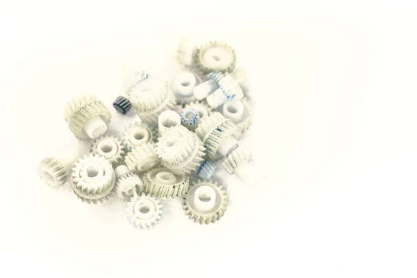 Dirty plastic gears on white background - Photo, Image