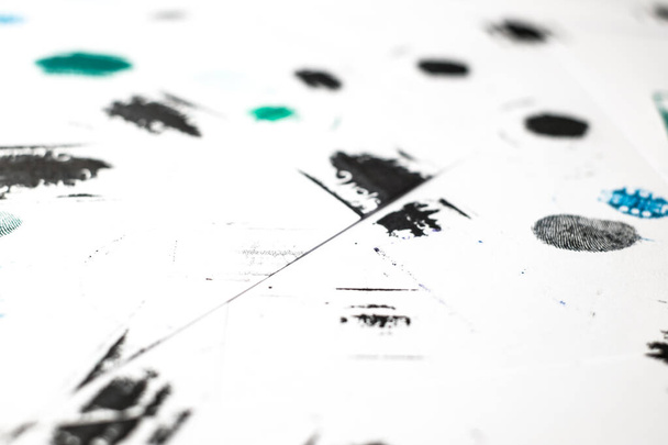 fingerprint and stamp on white paper - Foto, Imagen