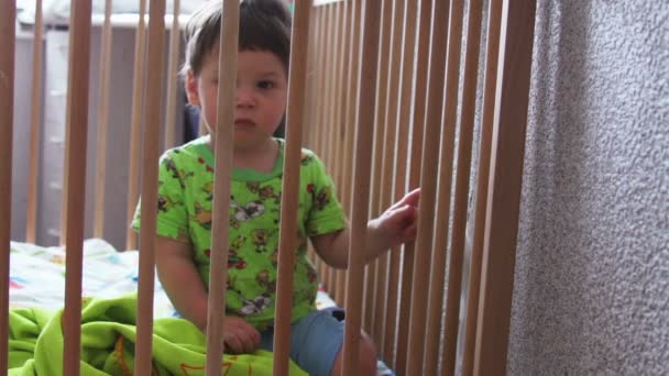 Little boy in a crib - Footage, Video