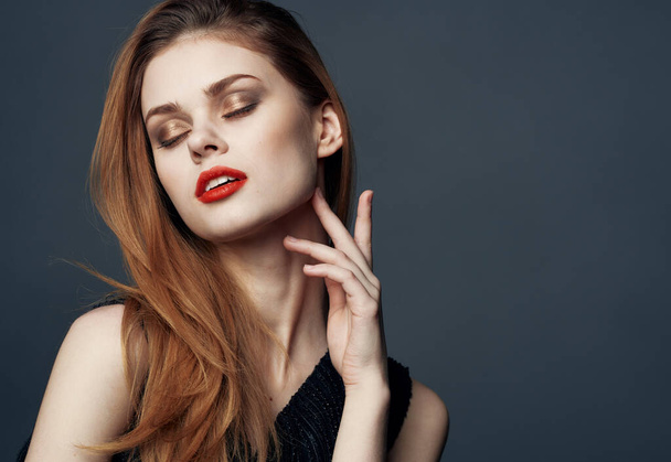 Portrait of beautiful woman with red lips makeup model gray background - Zdjęcie, obraz