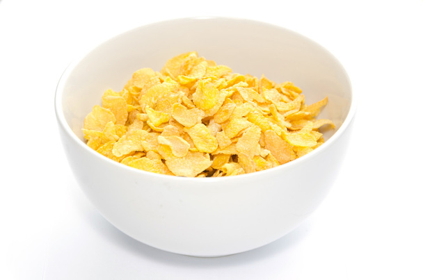 Corn flakes in bowl isolated - Photo, Image