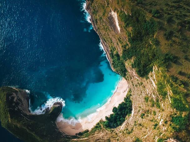 stunning ,secluded beach surrounded by mountains ,the view from the top. - 写真・画像