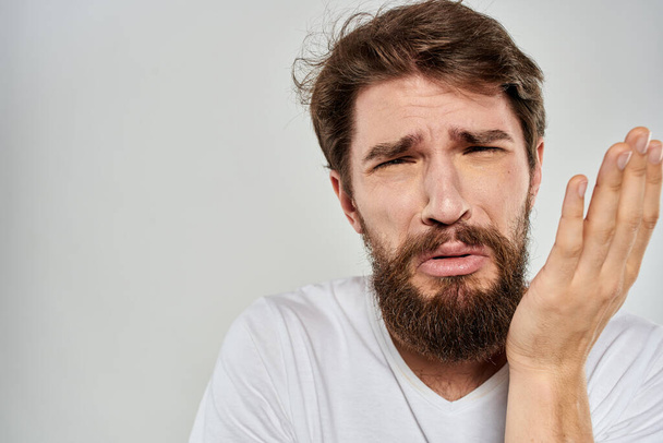 emotional bearded man close-up facial expression studio lifestyle - Photo, image