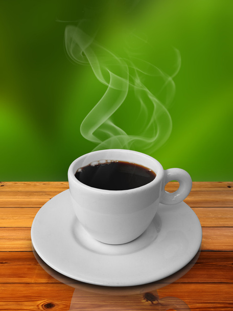 Cup of hot coffee on wood table - Foto, imagen