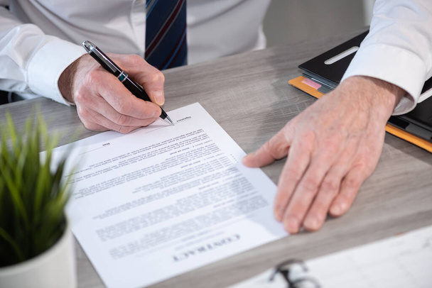 Hand of businessman signing a contract  - Photo, Image