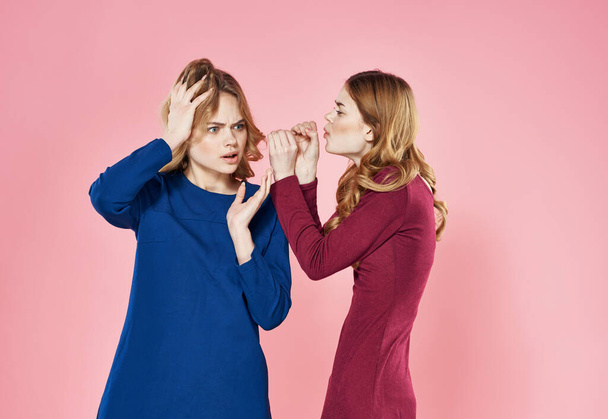 Two elegant women in lifestyle dresses chatting gossip - Fotoğraf, Görsel