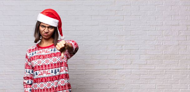 pretty woman with santa hat. christmas concept - Photo, image