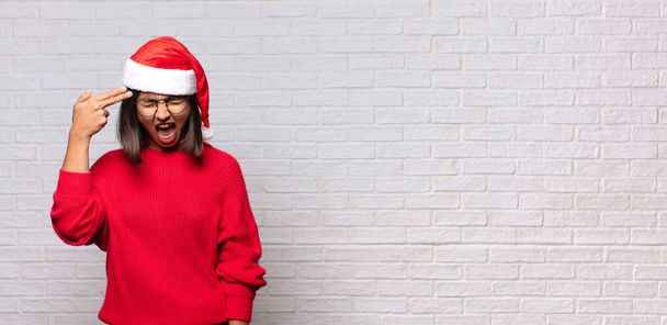 pretty woman with santa hat. christmas concept - Fotoğraf, Görsel