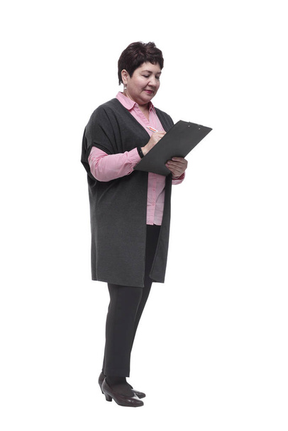 in full growth. confident mature woman with clipboard - Foto, Imagem