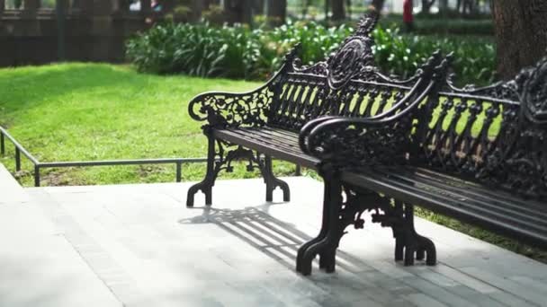 Classic Metal Benches at the Alameda Central Public Park - Materiał filmowy, wideo