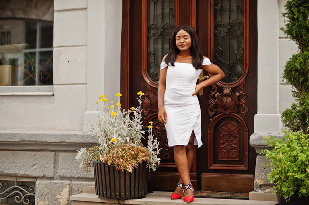 African american woman in white dress posed outdoor - Photo, image