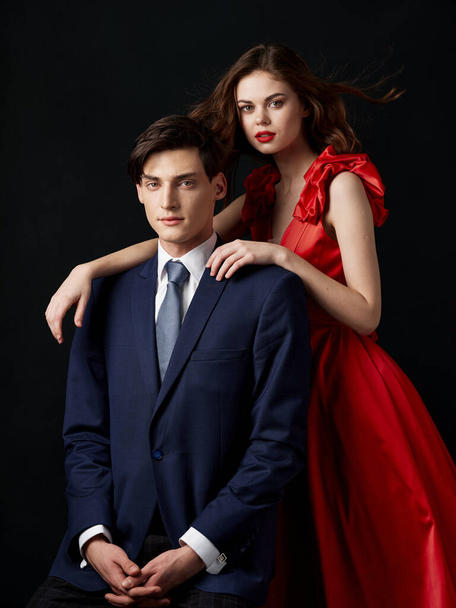 Pin-up couple portrait woman in red dress man in suit  - Fotoğraf, Görsel