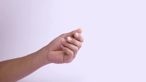 Levá dlaň, palec třít se zbývajícími 4 prsty, je požádán, aby zaplatil - Záběry, video