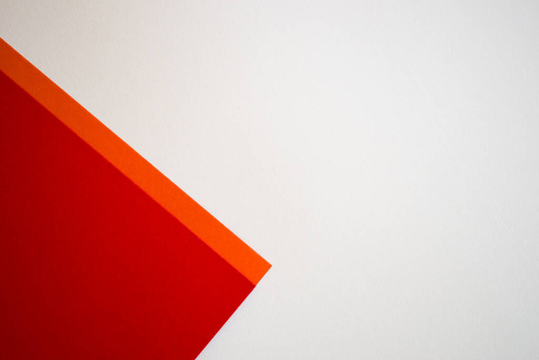 Red and white geometric background wallpaper with orange line - Foto, Imagen