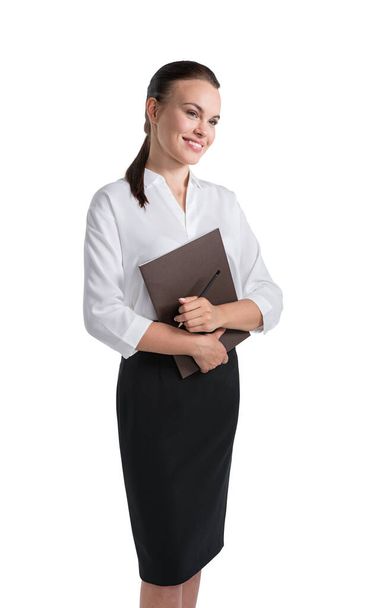 Isolated portrait of smiling young businesswoman with folder. Concept of business lifestyle - Φωτογραφία, εικόνα