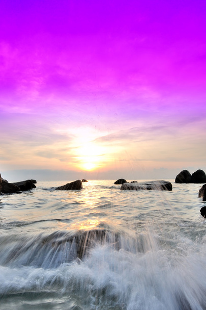 Sunrise view  of sea and rocks with ocean waves - Photo, Image